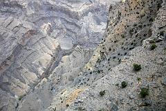 Muscat 07 11 Jebel Shams Canyon Looking Down Jebel Shams is the second deepest canyon in the world after the Grand Canyon in the USA. We walked to the canyon rim and stared over the 2km vertical drop to the bottom of the canyon.